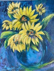 "Sunflowers in a Blue vase"