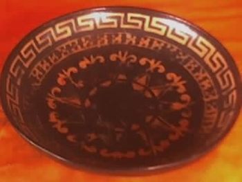 "Shallow wide bowl"