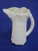"Relief Jug With Plain Handle"