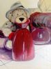 "Teddy with Red Pot"