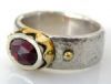 "Silver, 18ct crown ring with garnet"