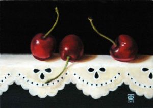 "Three Cherries on Lace"