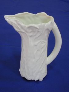"Relief Jug With Plain Handle"