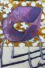 "Small Purple Chair With Yellow Background"